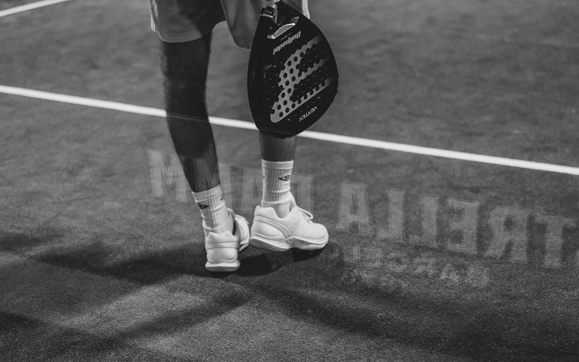 A player walks back to the baseline with his racket during the Euro Padel League Belfast Cup at Padel54