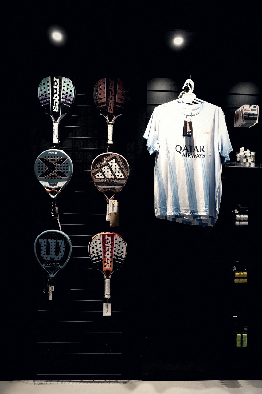 Rackets on the wall in the pro shop